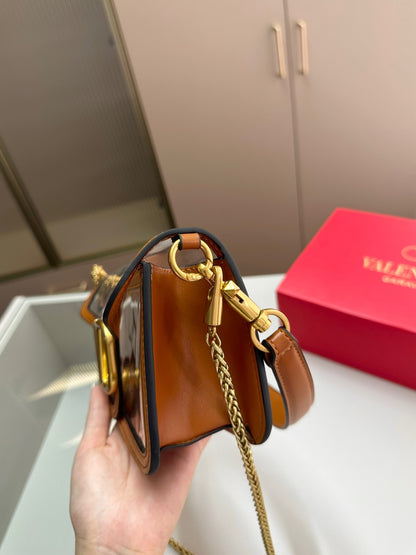 VALENTINO GARAVANI LOC? PVC AND LEATHER SHOULDER BAG BROWN 24CM