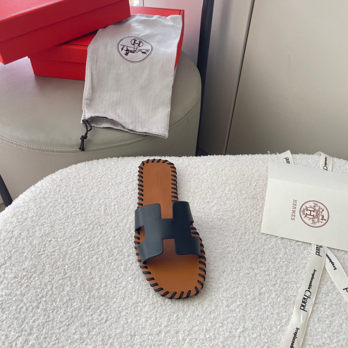 HERMÈS ORAN SANDALS STITCHING IN BLACK AND BROWN