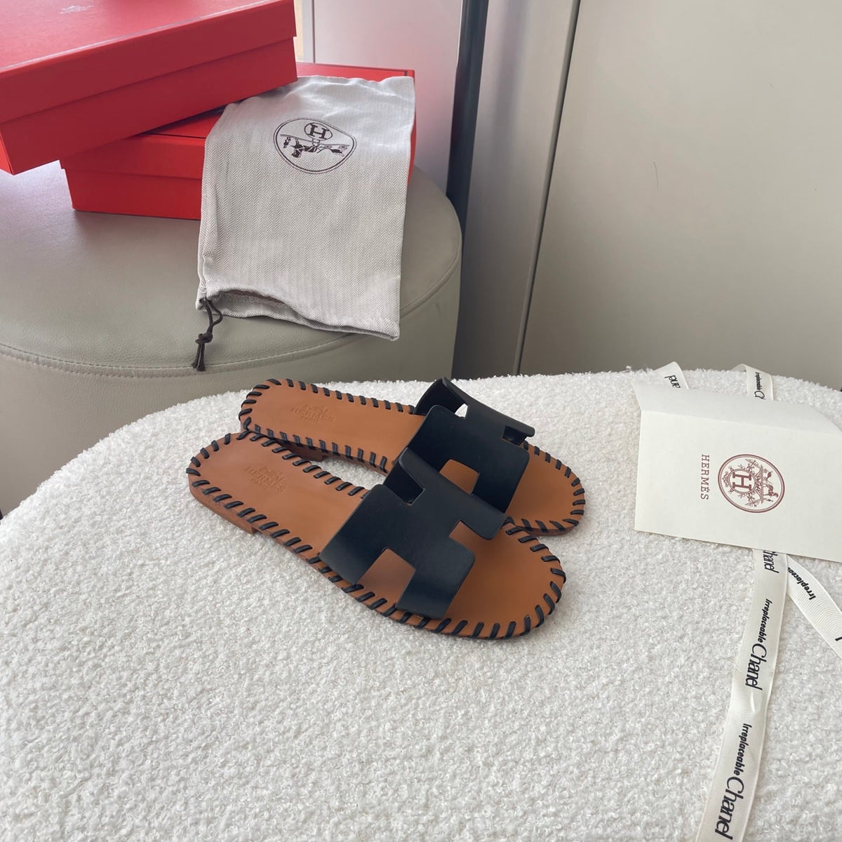 HERMÈS ORAN SANDALS STITCHING IN BLACK AND BROWN