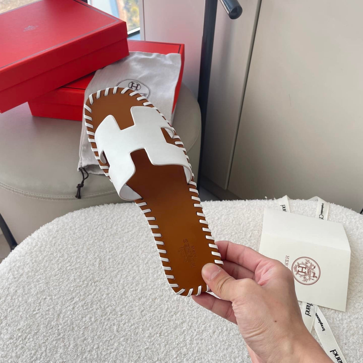 HERMÈS ORAN SANDALS STITCHING IN BROWN AND WHITE