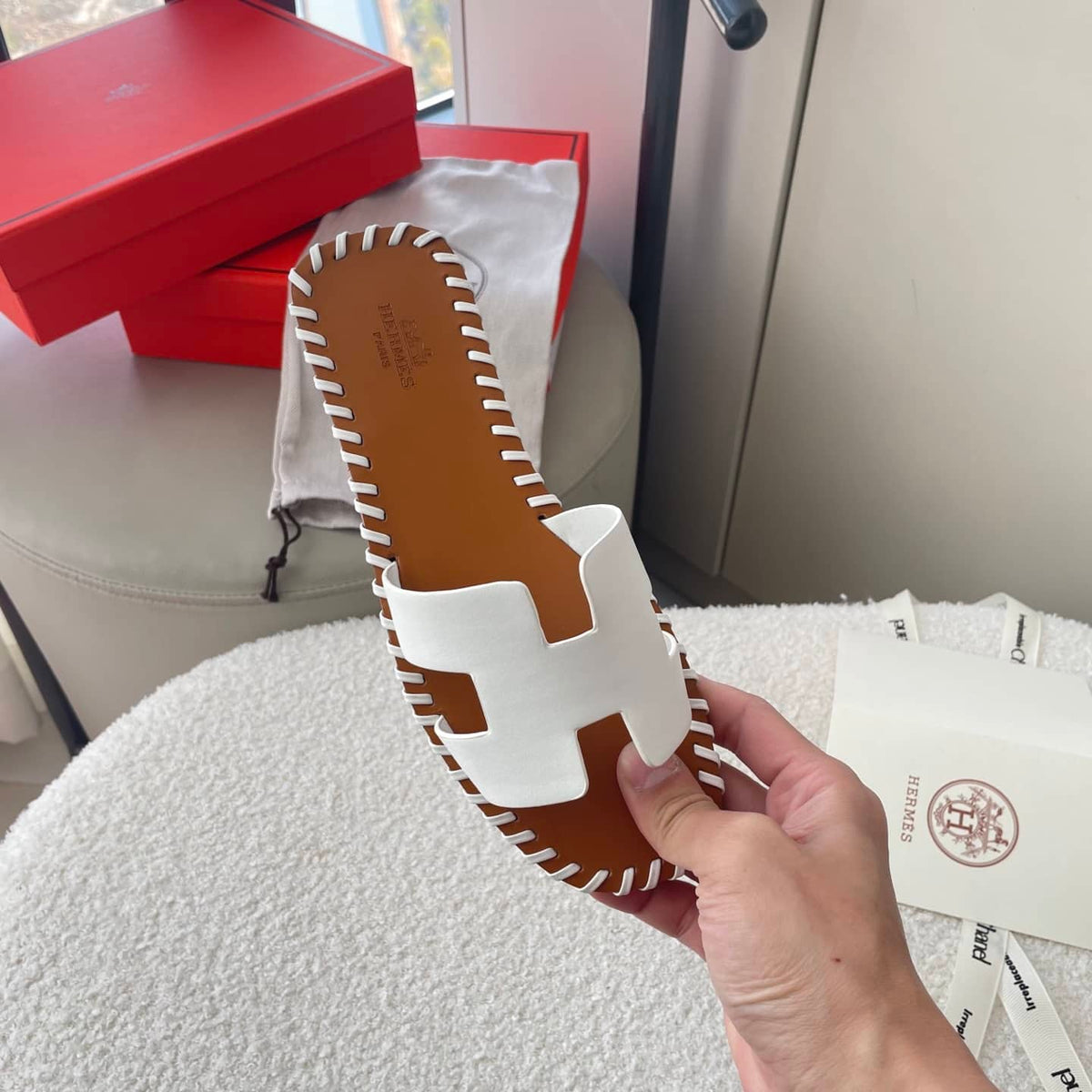 HERMÈS ORAN SANDALS STITCHING IN BROWN AND WHITE