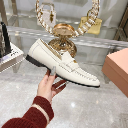 MIUMIU LEATHER LOAFERS WHITE