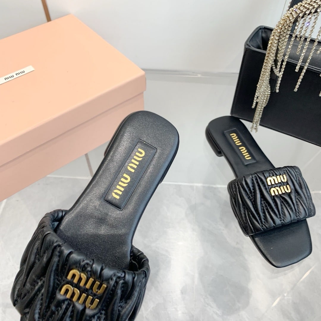 MIUMIU MATELASSÉ NAPPA LEATHER SLIDES BLACK