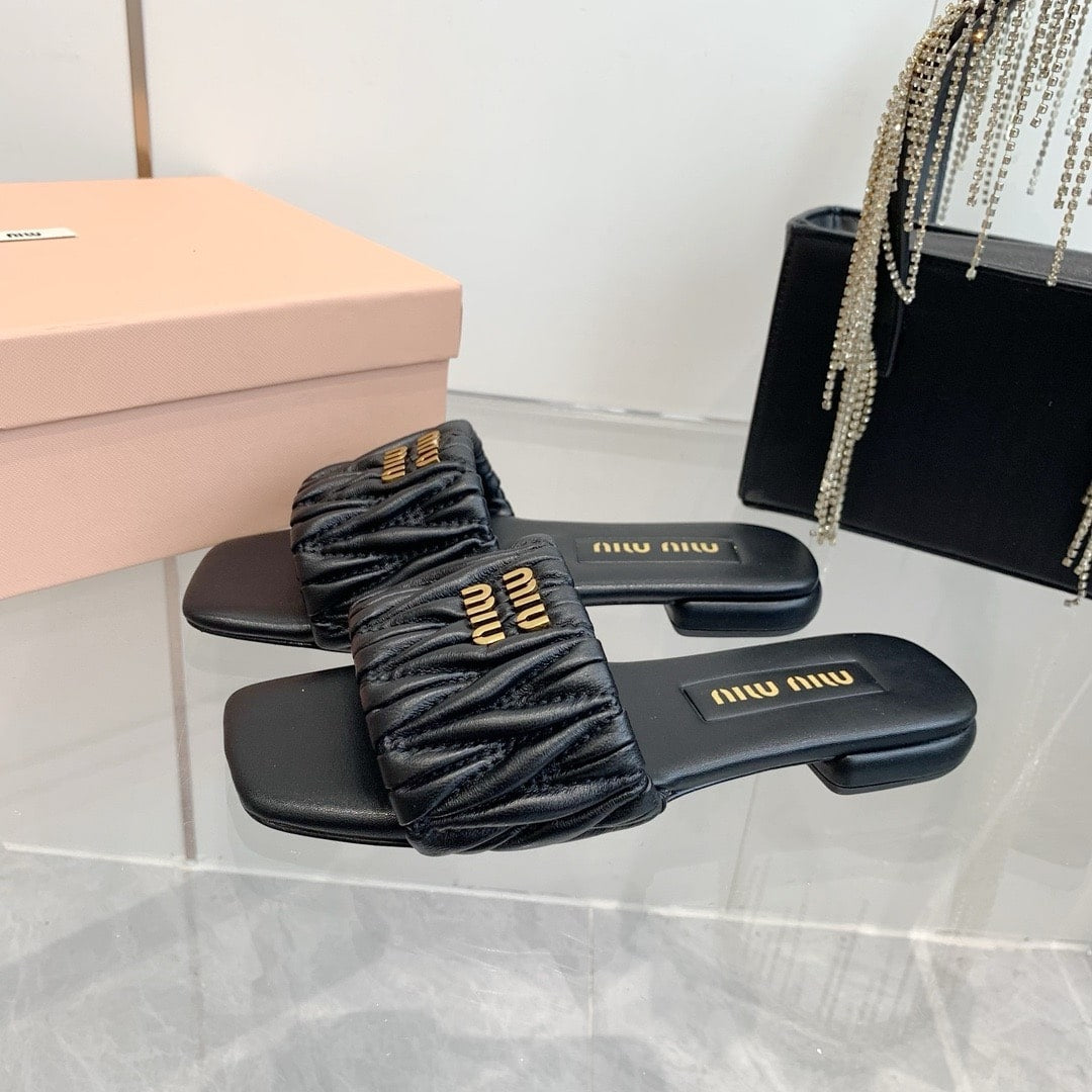 MIUMIU MATELASSÉ NAPPA LEATHER SLIDES BLACK