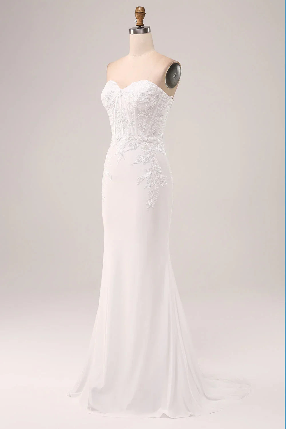Ivory strapless off shoulder fishtail off back wedding dress