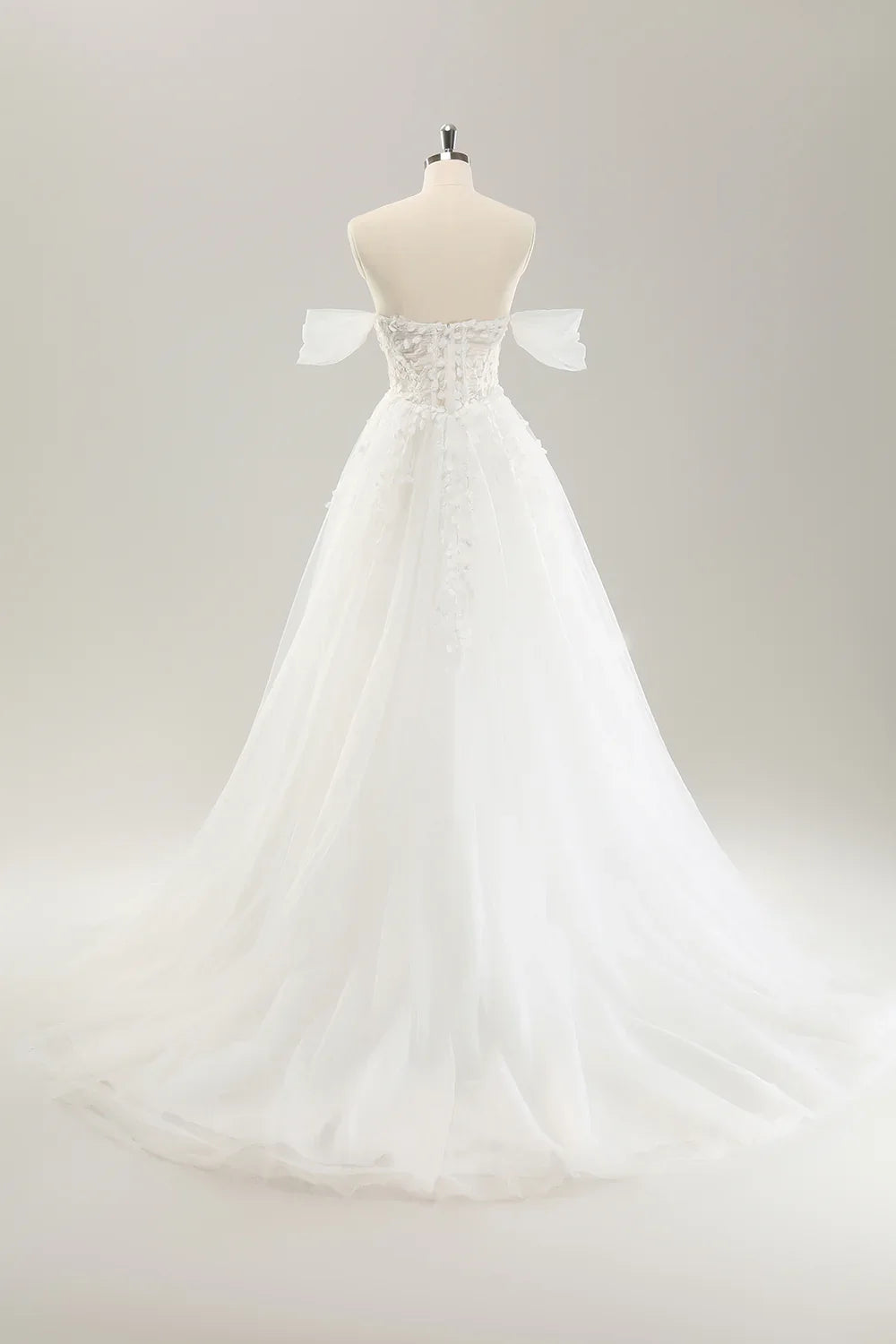 Princess style off the shoulder sweeping with decals and trailing lines