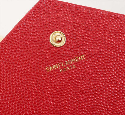 SAINT LAURENT CASSANDRE MATELASSÉ ENVELOPE CHAIN WALLET IN GRAIN DE POUDRE EMBOSSED LEATHER OPYUM RED 695108BOW016008