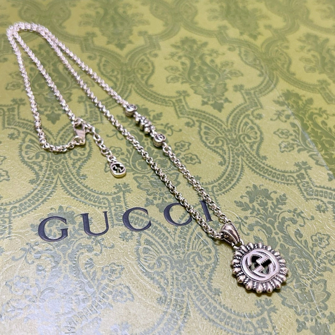GUCCI INTERLOCKING G LOGO EMBELLISHED PENDANT STATION NECKLACE GOLD TONE