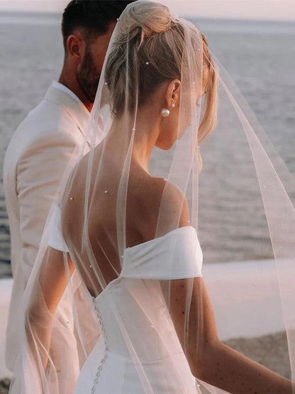 Sheath/Column Crepe Ruched Off-the-Shoulder Sleeveless Chapel Train Wedding Dresses